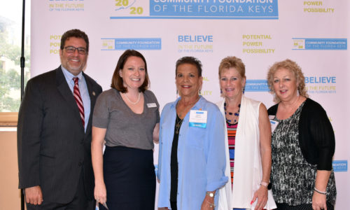 Members of the Florida Keys Outreach Coalition with Unsung Hero Robin Williams.